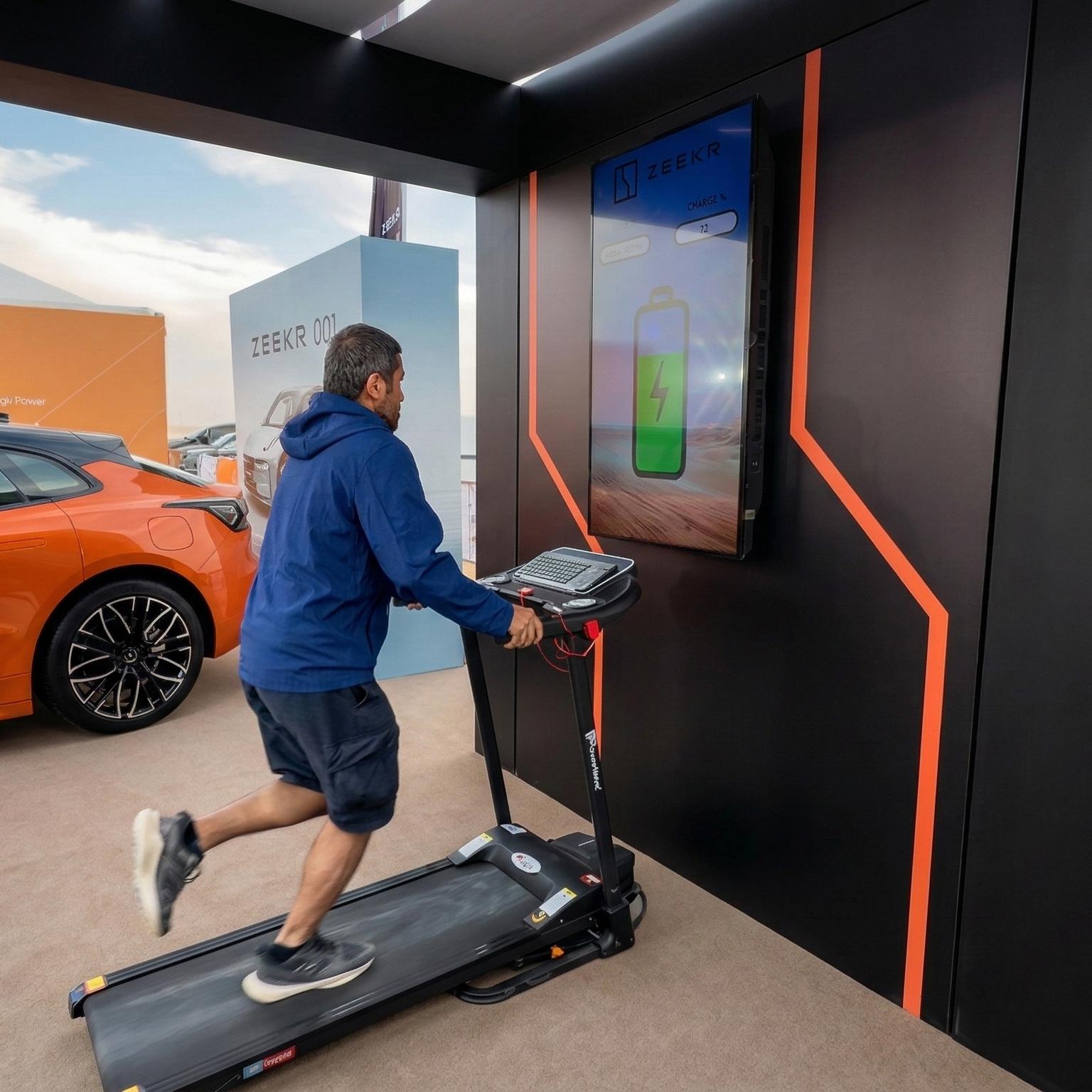 Interactive Treadmill Activation in Dubai: Participants generating human power to recharge EV cars
